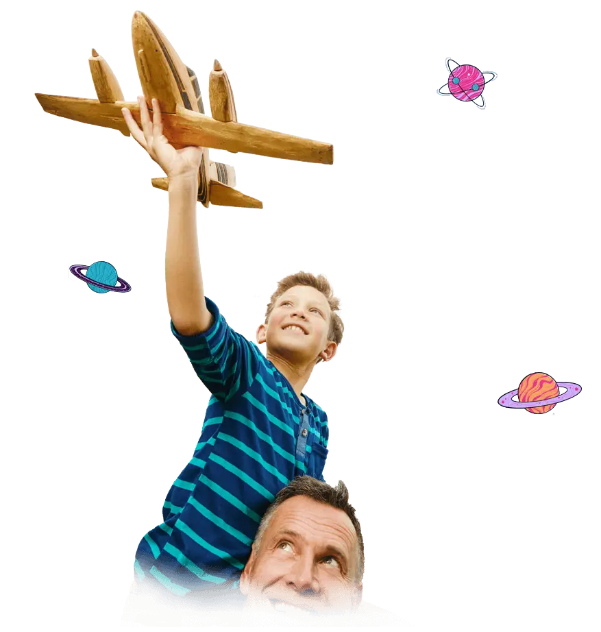 Father and his son playing with paper plane.